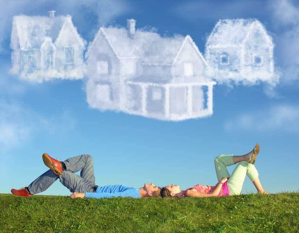 people dreaming of house mortgage under clouds