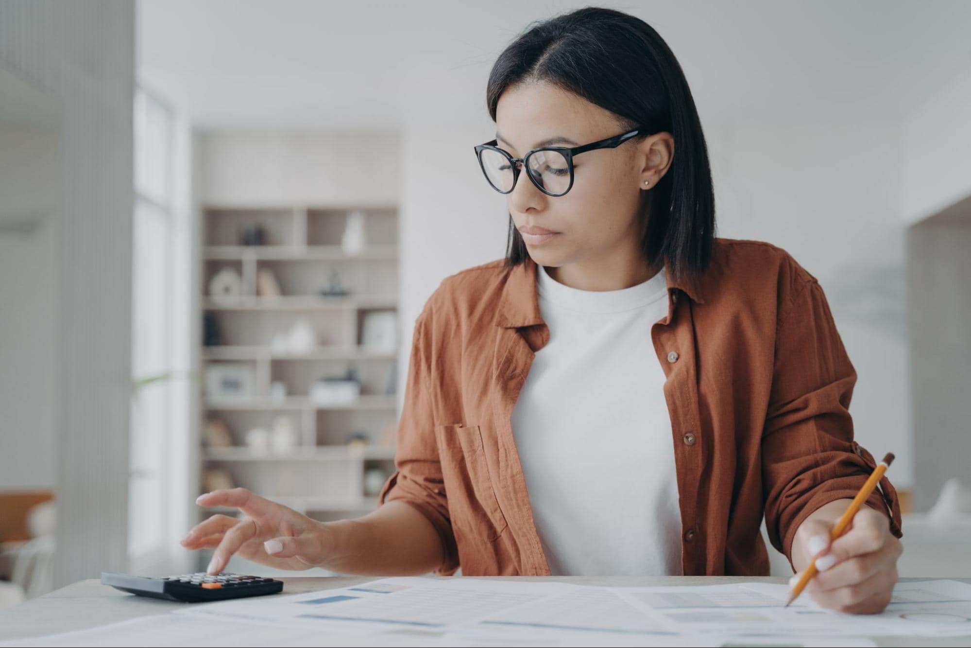 woman calculating home equity loan rates in bc
