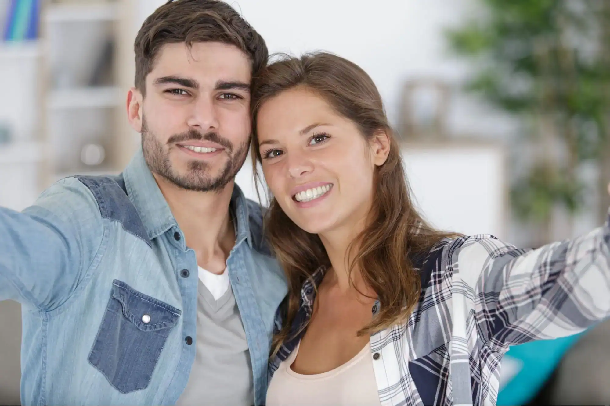 couple happy after a cash out refinance